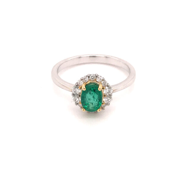 Oval Emerald and Diamond Halo Ring : Professional Jewelers